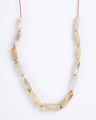 yellow opal puka tassel necklace - yellow and stone
