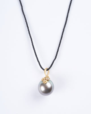 tahitian pearl with 18k yellow gold and diamond details