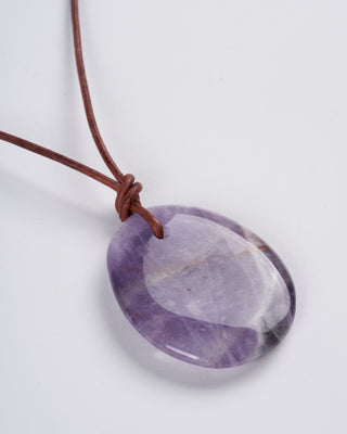 amethyst on leather - stone purple
