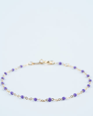 mauve bead bracelet - yellow gold