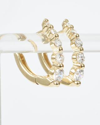 small oval graduated diamond huggie hoops - gold/diamonds