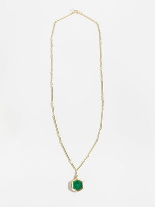 gold cast line necklace with emerald pendant