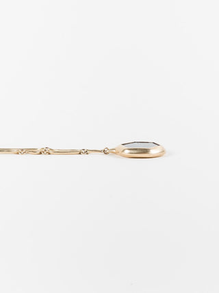 10k gold cast line sapphire pendant